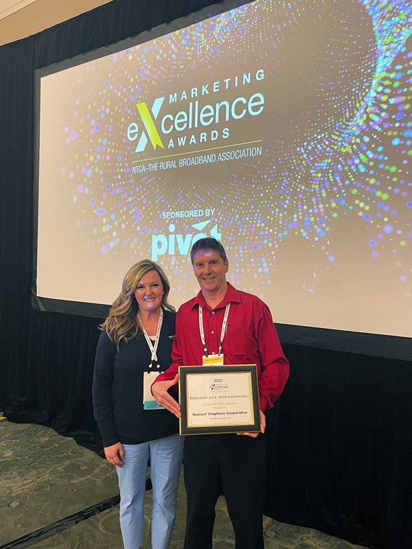 Kristen O'Toole & Gregg Hunter accept NTCA Marketing Award